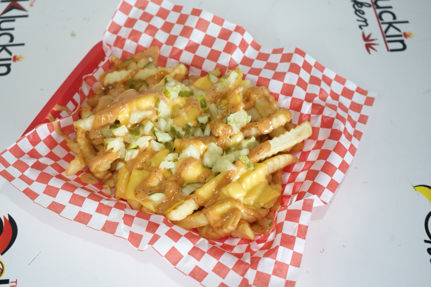 Loaded fries in a checkered basket